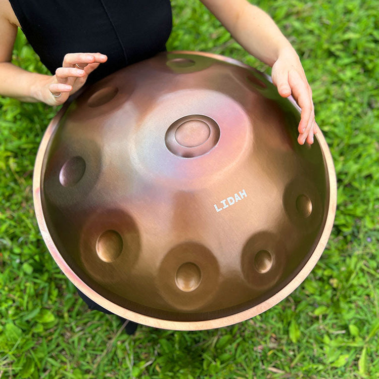 LIDAH® Handpan glowing in soft studio light